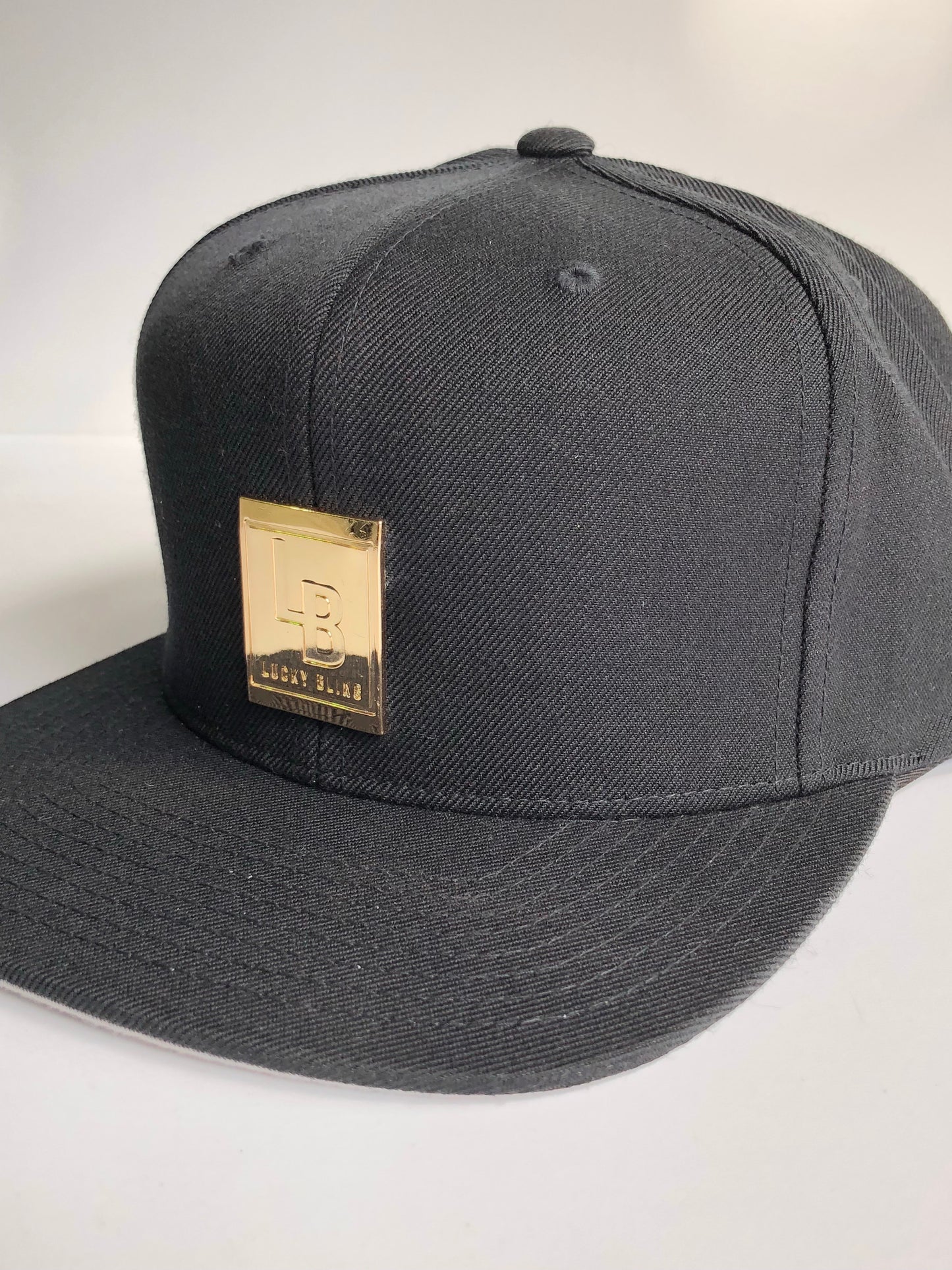 GOLD LABEL SNAP BACK