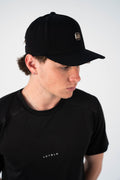 Next Move Perforated Cap in Black