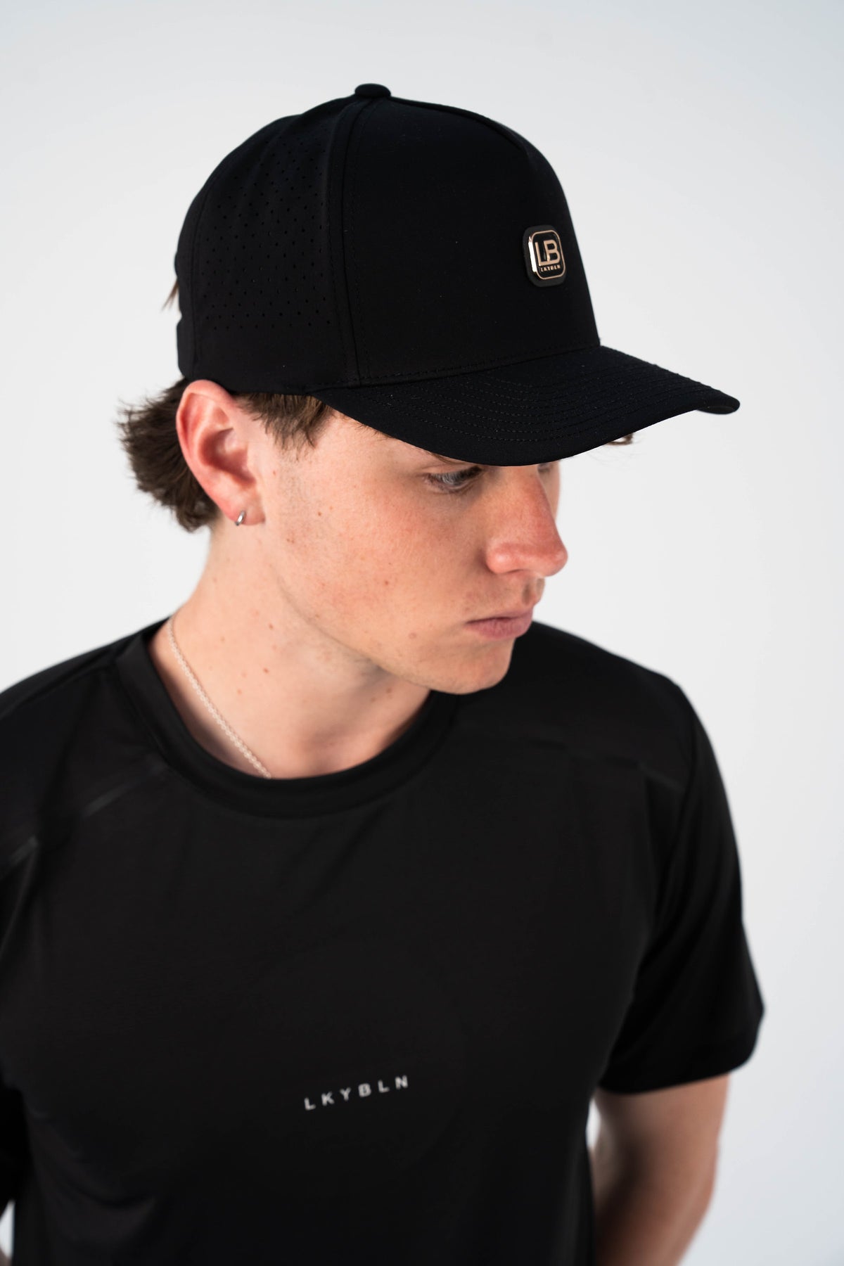 Next Move Perforated Cap in Black
