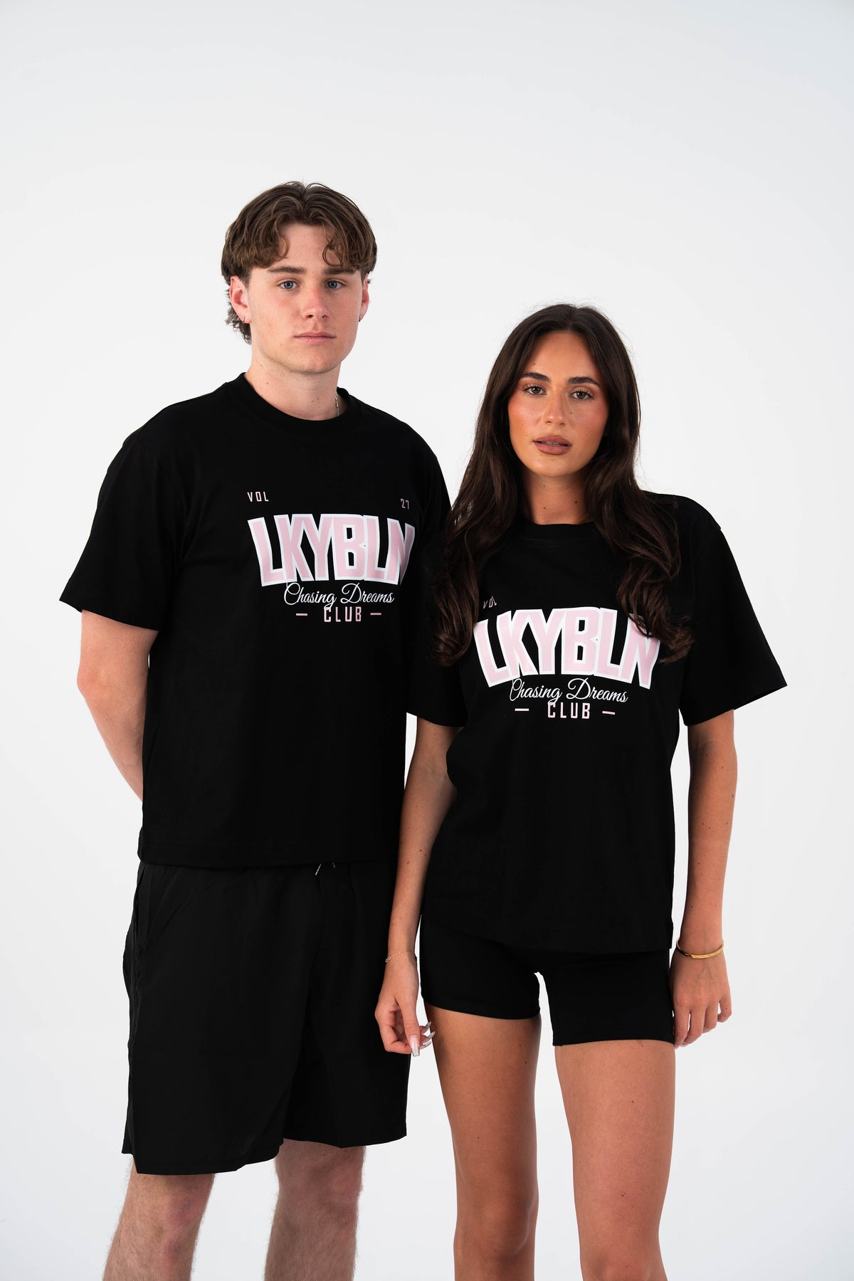 Chasing Dreams Club Tee – Pink Print in Black