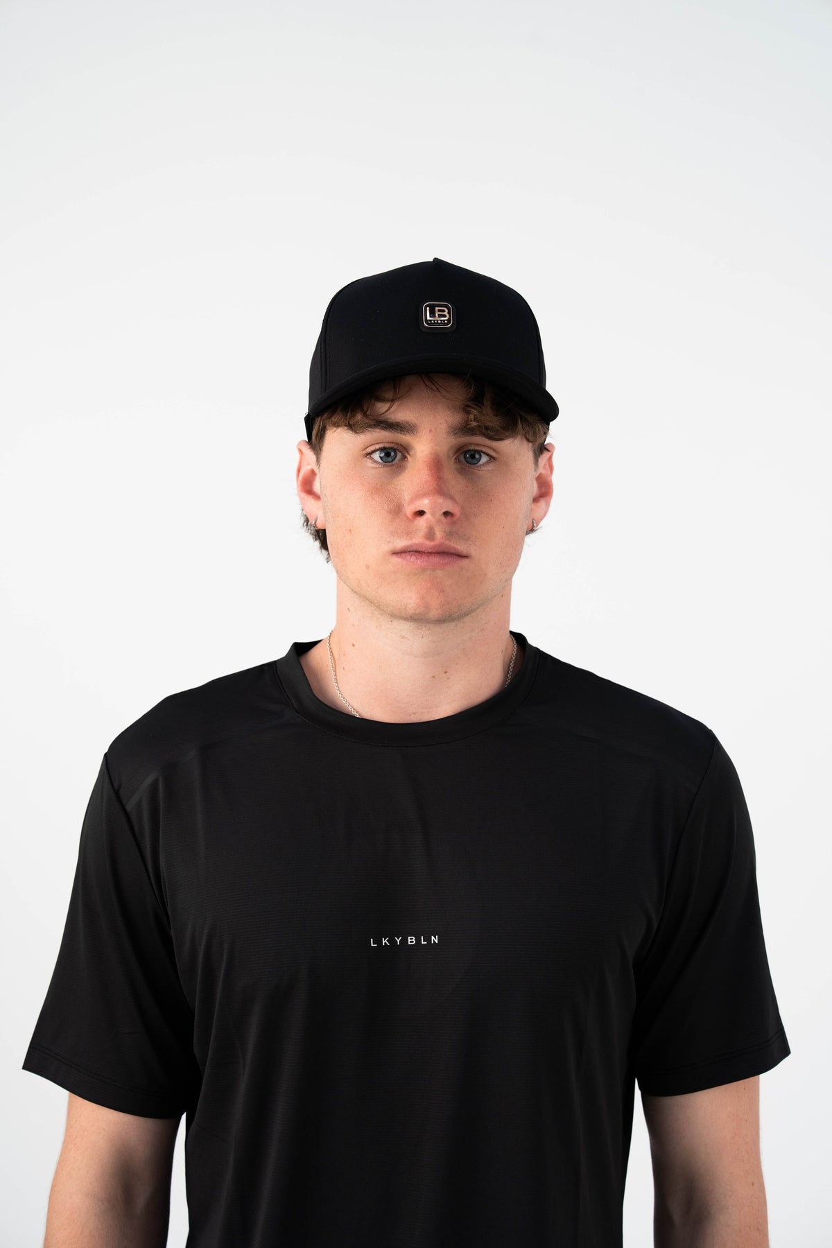 Next Move Perforated Cap in Black